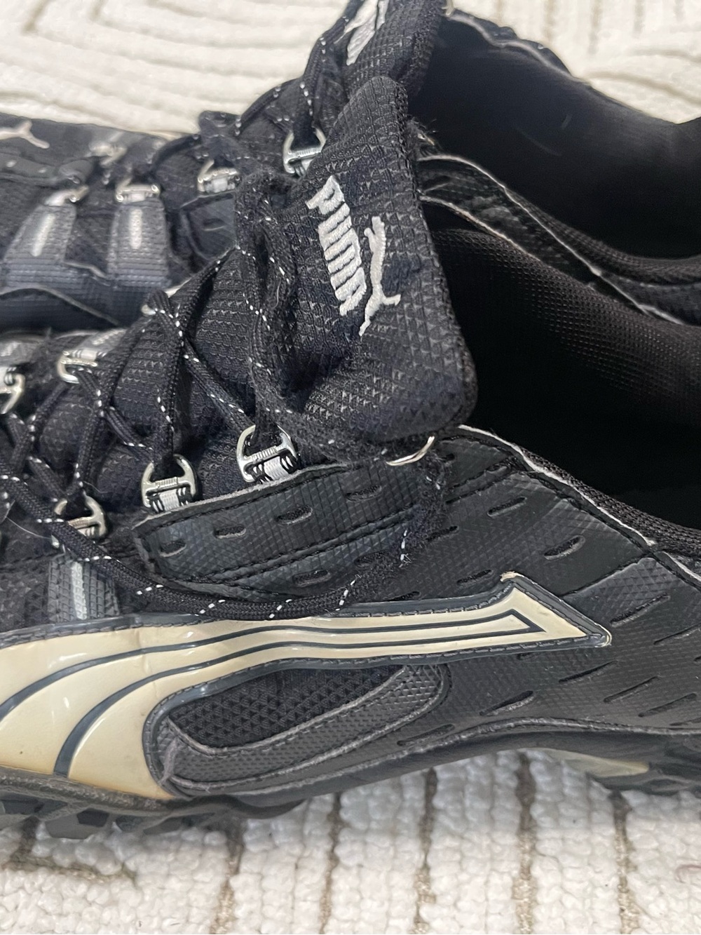 Puma Men’s Black Athletic Sneakers with Cream Accents
